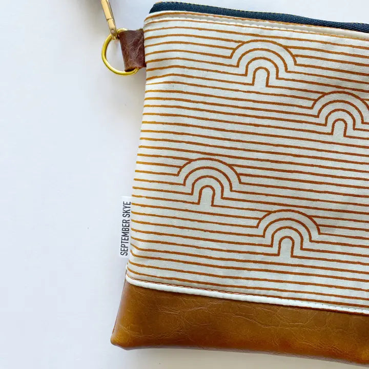 Small Crossbody Bag in Linear Caves Saddle